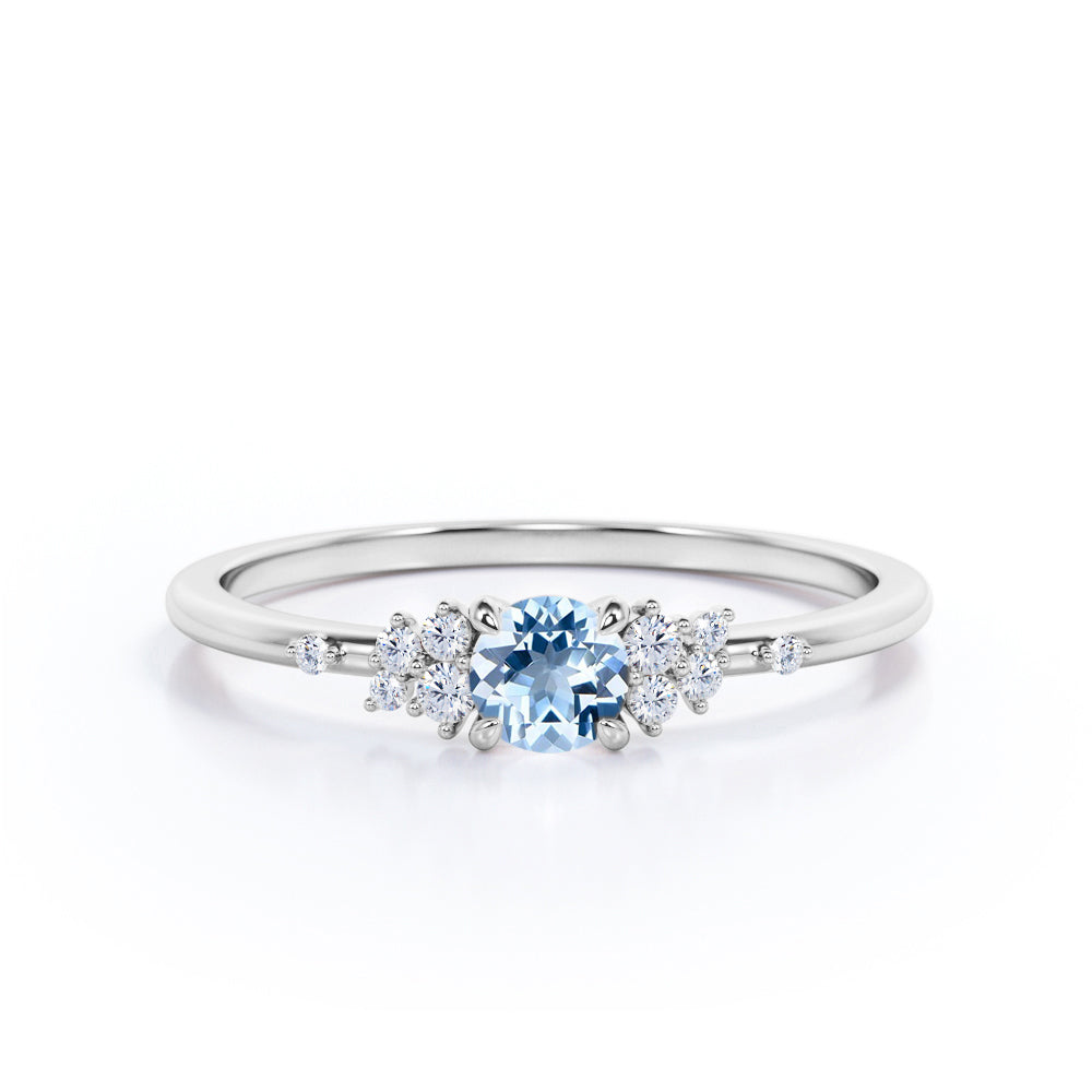 Modern 4 Prong 1.25 Carat Round Cut Genuine Vivid Blue Aquamarine and Diamond Cluster Engagement Ring