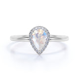 Elegant 1.25 Carat Pear Blue Moonstone and Diamond Pave Engagement Ring in Rose Gold