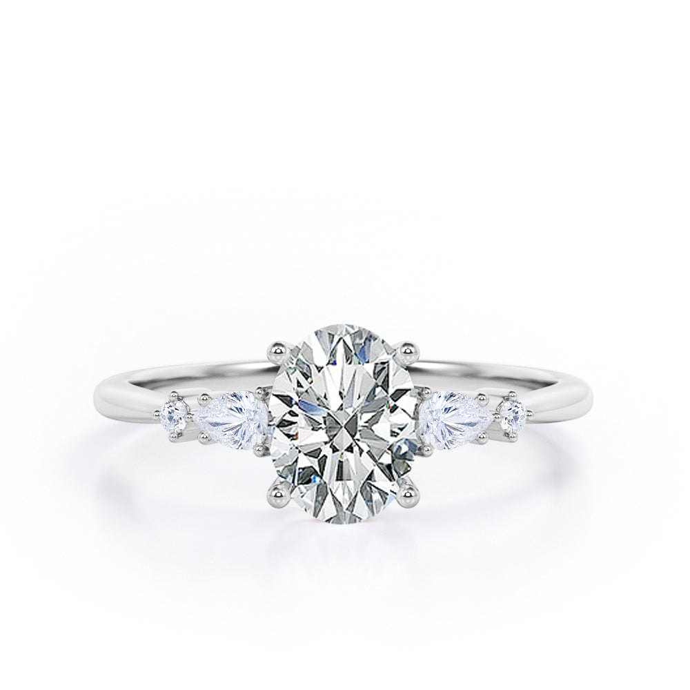 Classic Five Stone 0.6 carat Oval Moissanite and Diamond Engagement Ring in Rose Gold