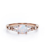 Split Shank 0.6 carat Round Opal and Diamond Engagement Ring in Rose Gold