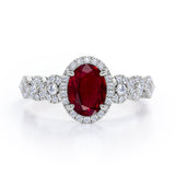 Twisted 1.45 Carat Oval Cut Lab Ruby And Diamond Halo Engagement Ring In White Gold
