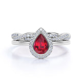 Classic Infinity Style 1.50 Carat Pear Shape Lab Ruby and Diamond Halo Wedding Ring Set in White Gold