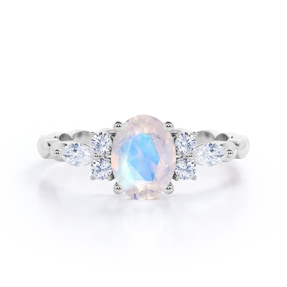 Marquise Beaded Shank 0.55 carat Oval Moonstone and Moissanite Engagement Ring in Rose Gold