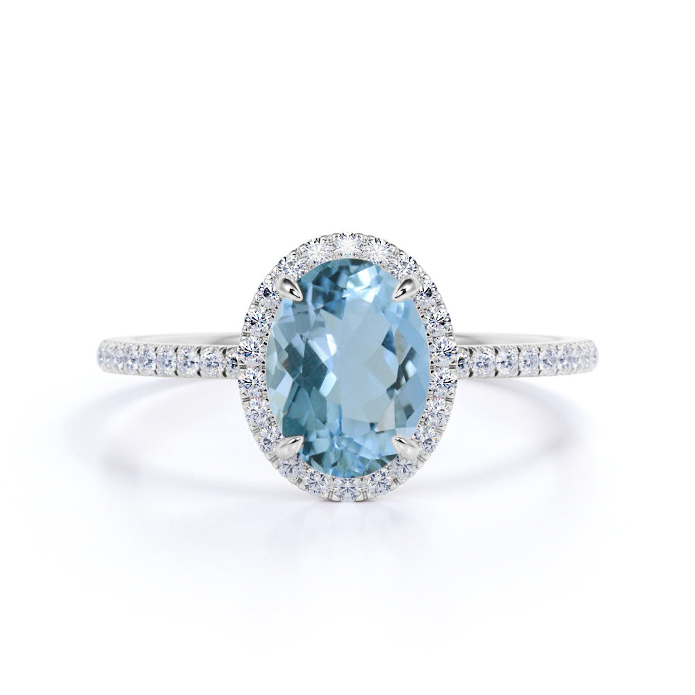 1.25 Carat oval cut Aquamarine and Diamond Halo Wedding Ring in Rose Gold