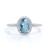 1.25 Carat oval cut Aquamarine and Diamond Halo Wedding Ring in Rose Gold