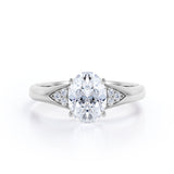 Tapered Shank 7 Stone 1.35 Carat Oval Cut Moissanite and Diamond Prong Basket Engagement Ring in White Gold