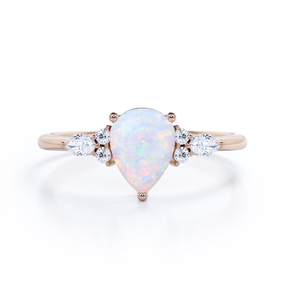 Affordable 1.35 Carat Tear Drop White Opal And Diamond  Seven Stone Engagement Ring In White Gold.