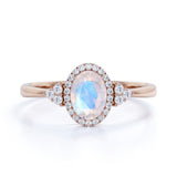 Vintage 1.50 Carat Oval Cut Blue Moonstone and Diamond Halo Engagement Ring in White Gold