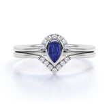 Designer 1.50 Carat Pear cut Sapphire and Diamond Halo Engagement Ring in White Gold