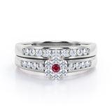 Flower Cluster Design 0.5 TCW Round-Shaped Ruby and Moissanite Flush-Channel Bridal Ring Set in Rose Gold