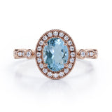 Vintage Halo 1.35 Carat Oval Cut Aquamarine And Diamond Art Deco Engagement Ring In Rose Gold