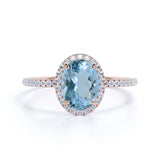 1.25 Carat oval cut Aquamarine and Diamond Halo Wedding Ring in Rose Gold