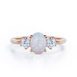 Three Stone 1.1 Ct Oval Cut Lab Created Opal Engagement Ring