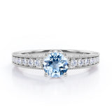 Classic Four Prong 1.45 Carat Round Cut Aquamarine And Diamond Vintage Milgrain Engagement Ring In White Gold