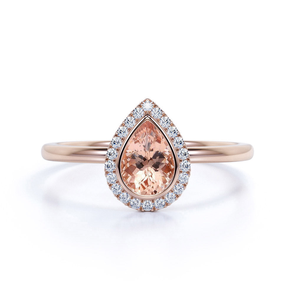 Elegant Pave 1.50 Carat Pear Shape Morganite and Diamond Halo Engagement Ring in White Gold