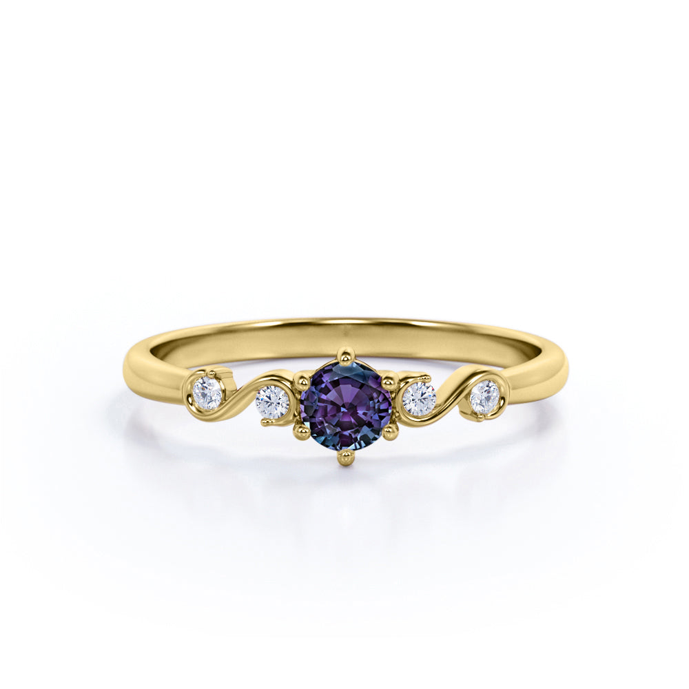 Classic Six Prong 1.10 Carat Round Cut Lab Created Alexandrite And Diamond Five Stone Engagement Ring In White Gold.