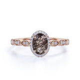 Antique Art Deco 1.50 Carat Oval Cut Transparent Black Brown Rutile Quartz and Diamond Halo Engagement Ring