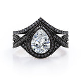Milgrain Halo-Style 1.75 TCW Pear Cut Moissanite with Lab Created Black Diamond Pave Channel Wedding Ring Set in Black Gold