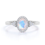 Vintage 1.50 Carat Oval Cut Blue Moonstone and Diamond Halo Engagement Ring in White Gold
