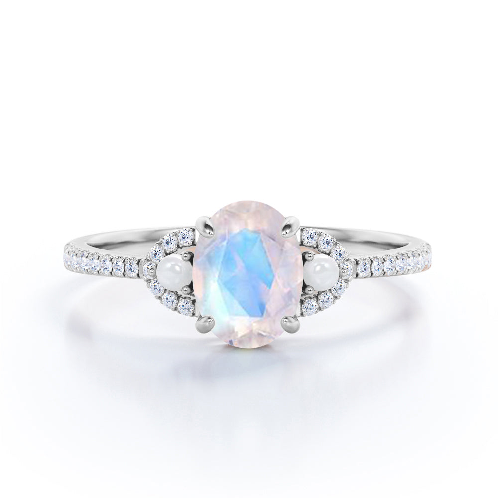 Butterfly 0.8 carat Oval Moonstone and Moissanite Engagement Ring in Black Gold