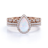 Art Deco Vintage 1.50 Carat Pear Shape Ethiopian Opal and Diamond Halo Trio Bridal Set in Rose Gold