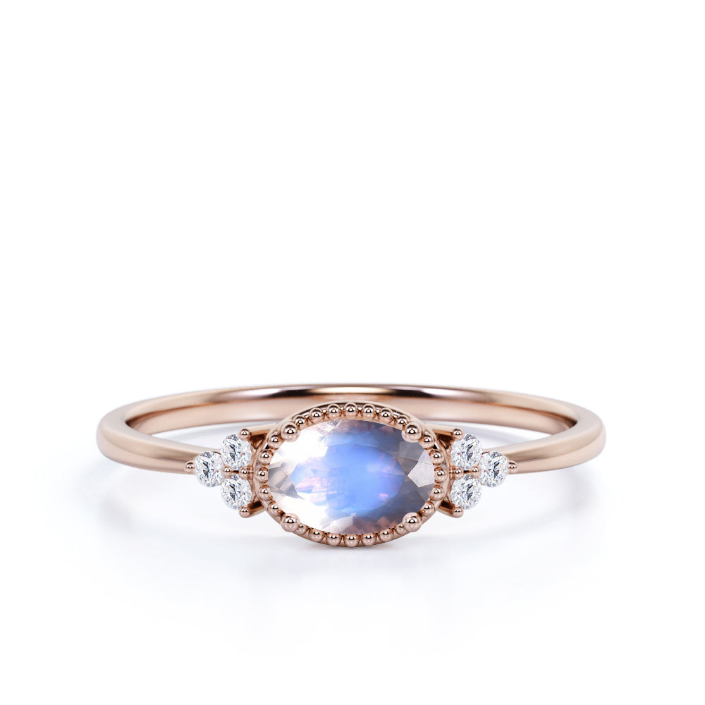 Unique East West 1.40 Carat Oval Cut Blue Moonstone and 7 Stone Diamond Engagement Ring in White Gold