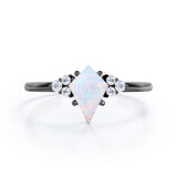 Unique Four Prong 1.30 Carat Kite Shaped Precious Fire Opal And Diamond Seven Stone Engagement Ring In Black Gold