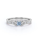 1.10 Carat Princess Cut Aquamarine And Diamond Vintage Milgrain Engagement Ring In White Gold.