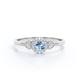 Double Hearts 1.15 Carat Round Cut Aquamarine And Diamond Halo Engagement Ring In White Gold