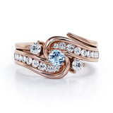 Twisted Tension - Prong 1 TCW Round Brilliant Cut Aquamarine and Moissanite - Flush Channel Wedding Set in White Gold