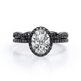 Four-Prong Halo 1.75 TCW Oval-Shaped Moissanite with Lab Created Black Diamond Pave Twisted Eternity Bridal Set in White Gold