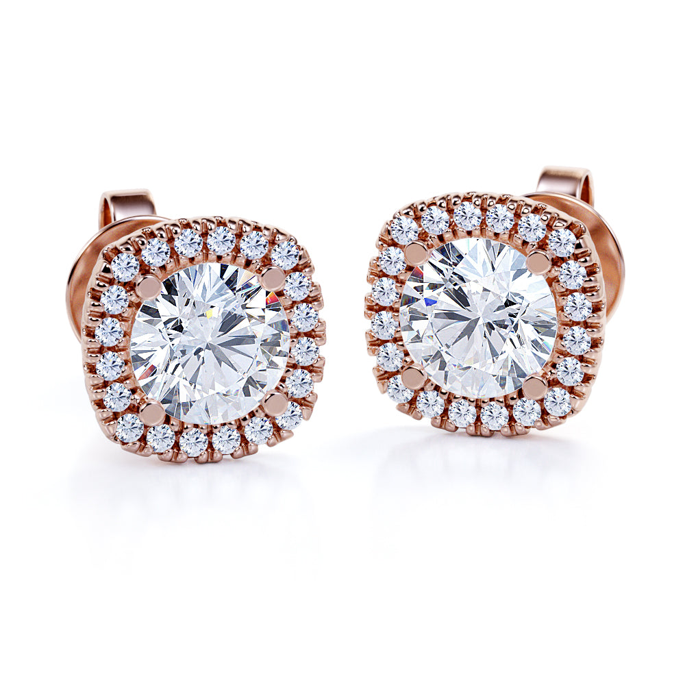 Four Prong 1.10 Carat Round Cut Moissanite And Diamond Halo Ear Studs In White Gold