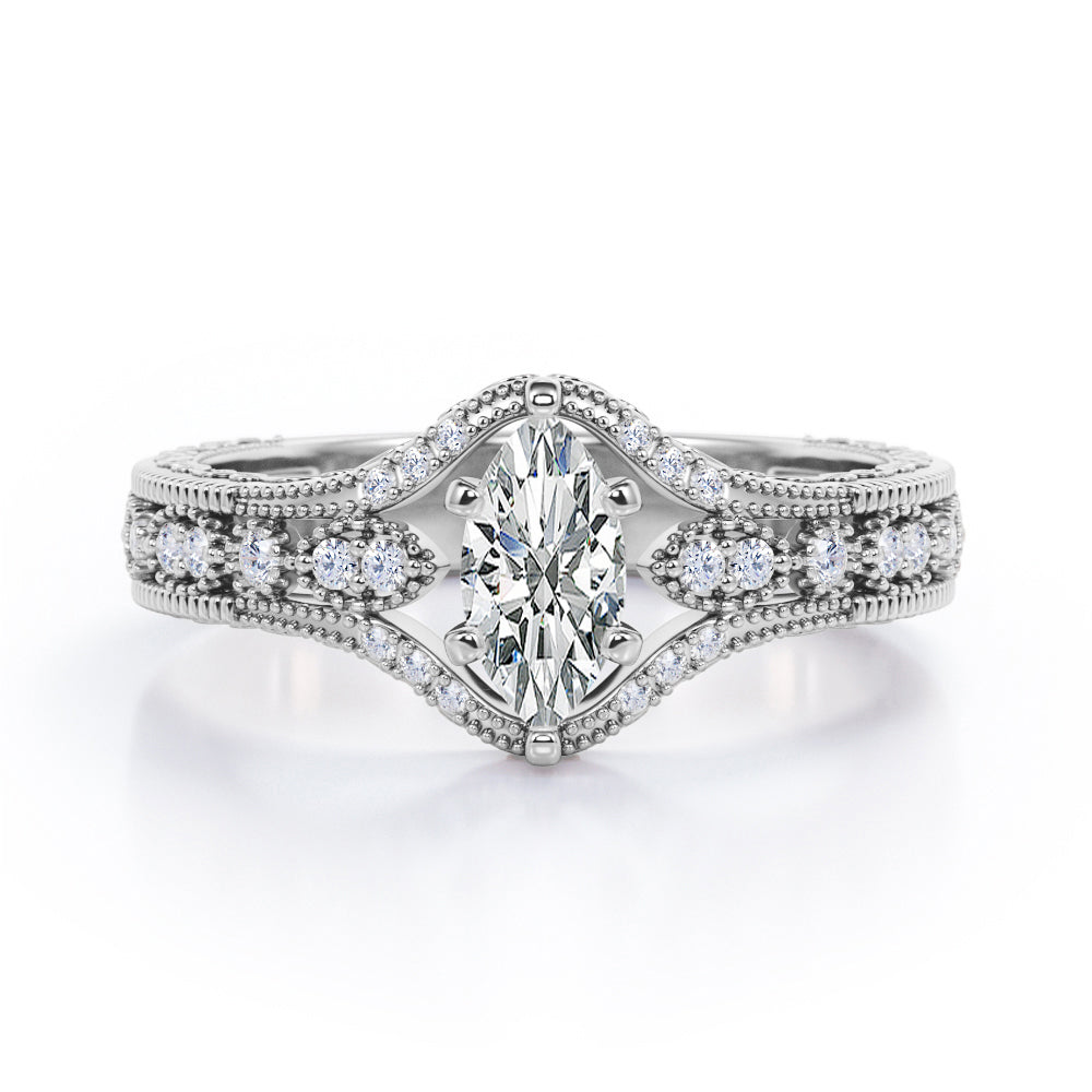 Beaded Framed 1.25 Carat Marquise Cut  Moissanite And Diamond Vintage Filigree Engagement Ring In Rose Gold