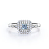 1.4 Carat Princess Cut Aquamarine And Diamond Cluster Engagement Ring In White Gold
