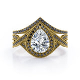 Milgrain Halo-Style 1.75 TCW Pear Cut Moissanite with Lab Created Black Diamond Pave Channel Wedding Ring Set in Black Gold