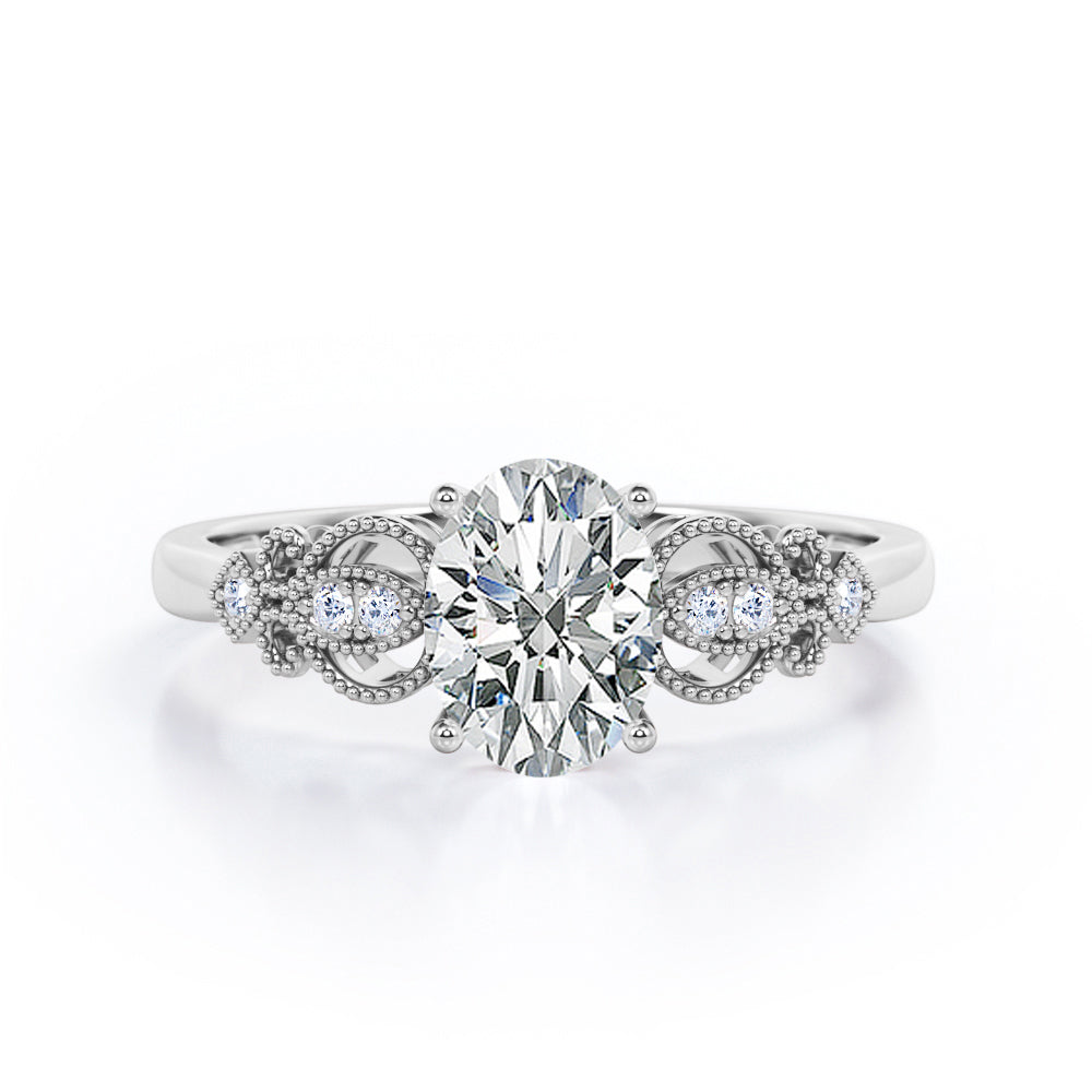 Swirly 0.5 carat Oval Moissanite and Diamonds Antique Engagement Ring in Black Gold