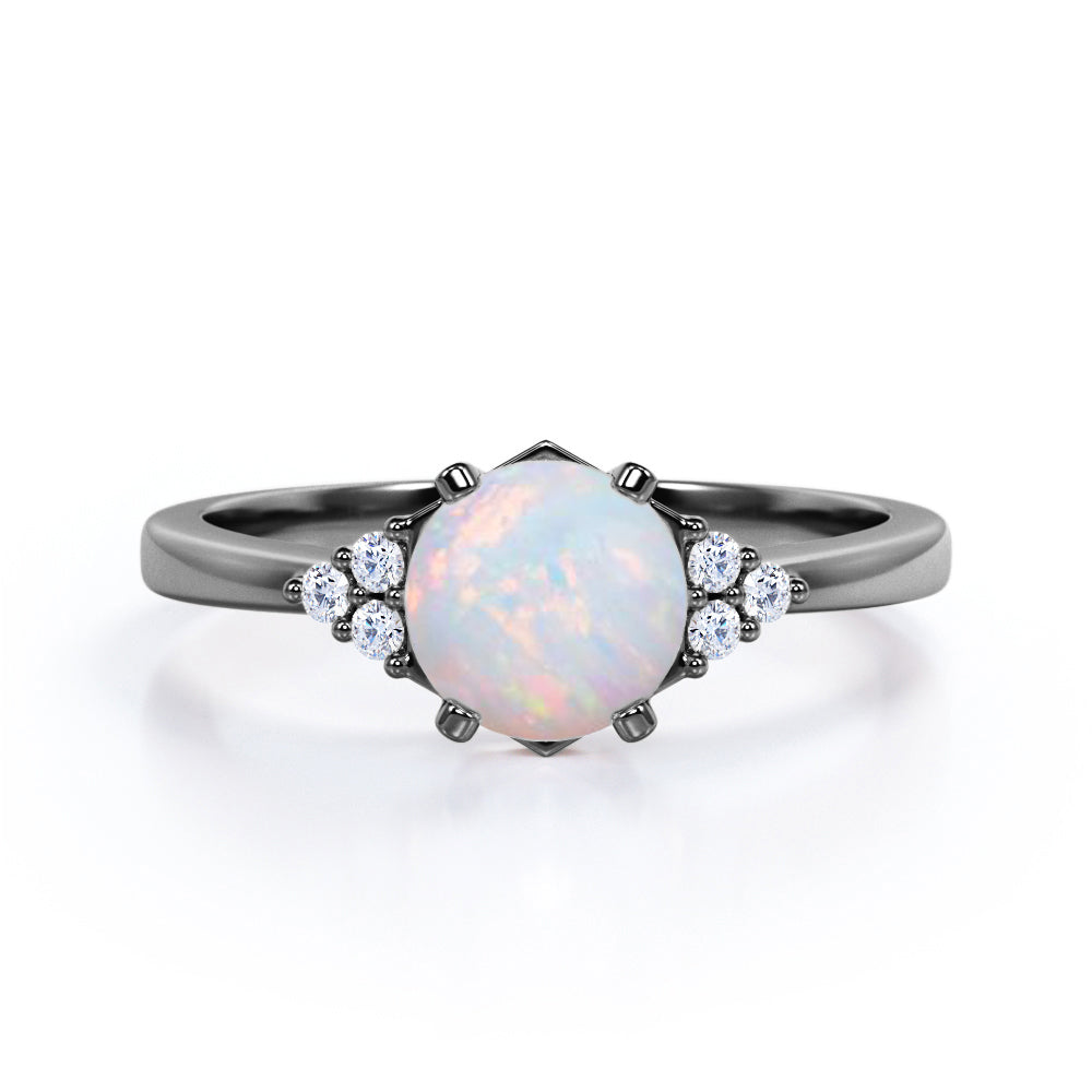 Seven Stone 1.25 Carat Round Cut Natural Opal And Diamond Tapered Engagement Ring In White Gold.