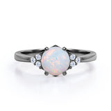 Seven Stone 1.25 Carat Round Cut Natural Opal And Diamond Tapered Engagement Ring In White Gold.