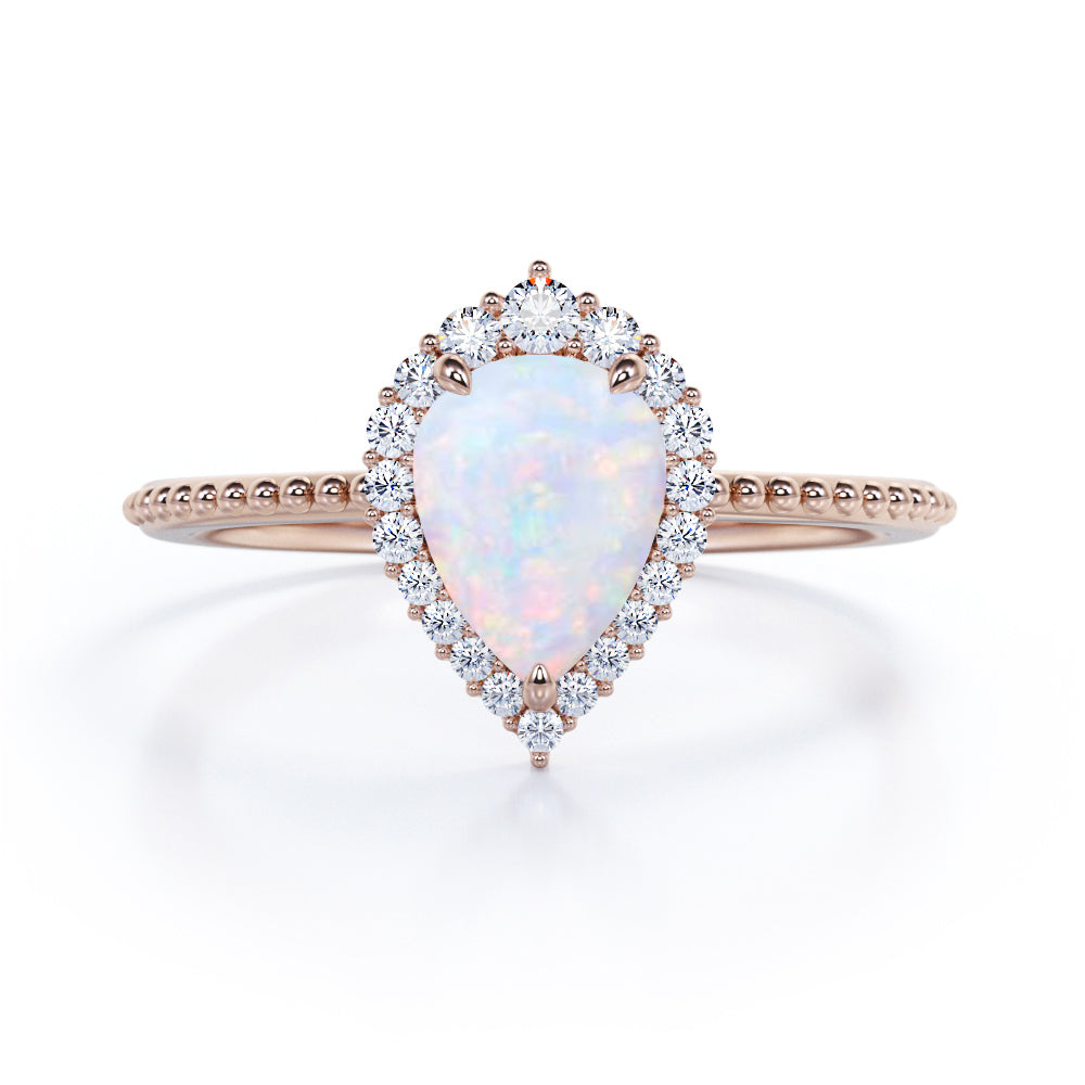 Vintage Inspired 1.35 Carat Tear Drop Fiery White Opal And Diamond Halo Engagement Ring In White Gold