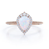 Vintage Inspired 1.35 Carat Tear Drop Fiery White Opal And Diamond Halo Engagement Ring In White Gold
