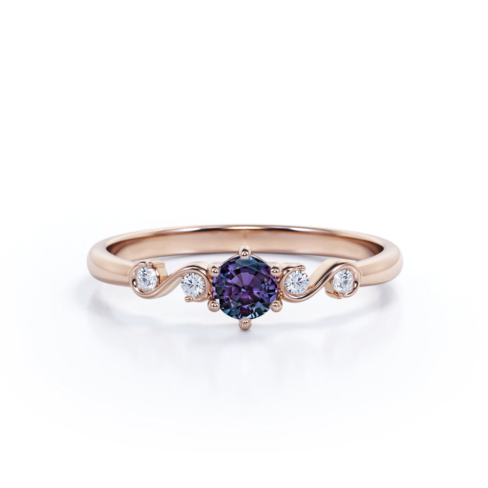 Classic Six Prong 1.10 Carat Round Cut Lab Created Alexandrite And Diamond Five Stone Engagement Ring In White Gold.