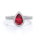 Elegant Pave 2 Carat Pear Shape Lab Ruby and Diamond Halo Wedding Ring Set in White Gold
