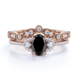 Exquisite Art Deco 1.75 Carat Oval cut Lab Black Diamond with Pearls Wedding Ring Set in Rose Gold