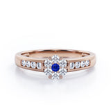 Clustered 1 carat Round Petite Blue Sapphire and Moissanites Channel Engagement Ring in White Gold