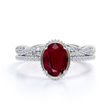 Stylish Infinity Design 1.50 Carat Oval Cut Lab Ruby and Diamond Bezel Wedding Ring Set in White Gold