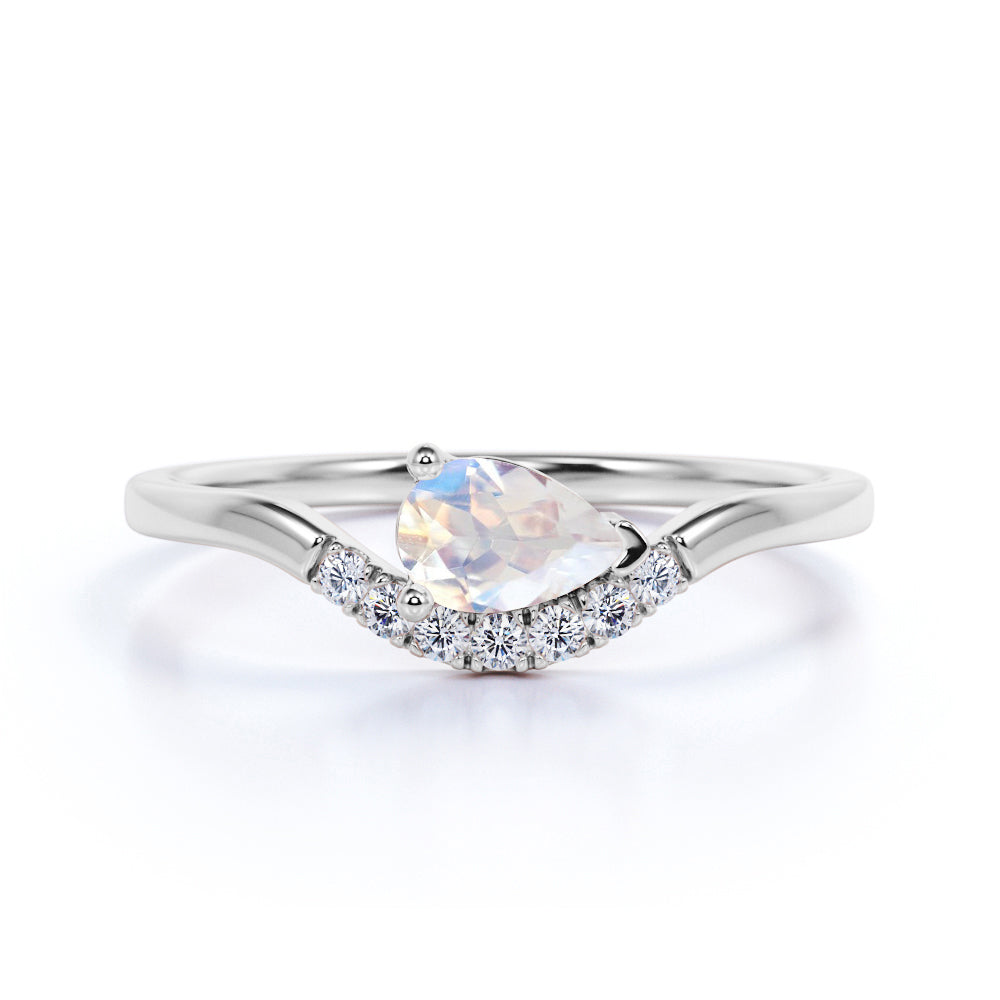 East West 1 Carat Teardrop White Blue Moonstone and Diamond Curved Engagement Ring in Rose Gold