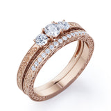 1.25 Carat Round Cut Near Colorless Moissanite And Diamond Three Stone Wedding Ring Set In White Gold