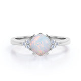 Seven Stone 1.25 Carat Round Cut Natural Opal And Diamond Tapered Engagement Ring In White Gold.