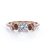 Sophisticated Roses 0.55 carat Round Moissanite Engagement Ring in Rose Gold
