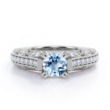 Beaded Four Prongs 1.40 Carat Round Cut Aquamarine And Diamond Vintage Art Deco Engagement Ring In Rose Gold